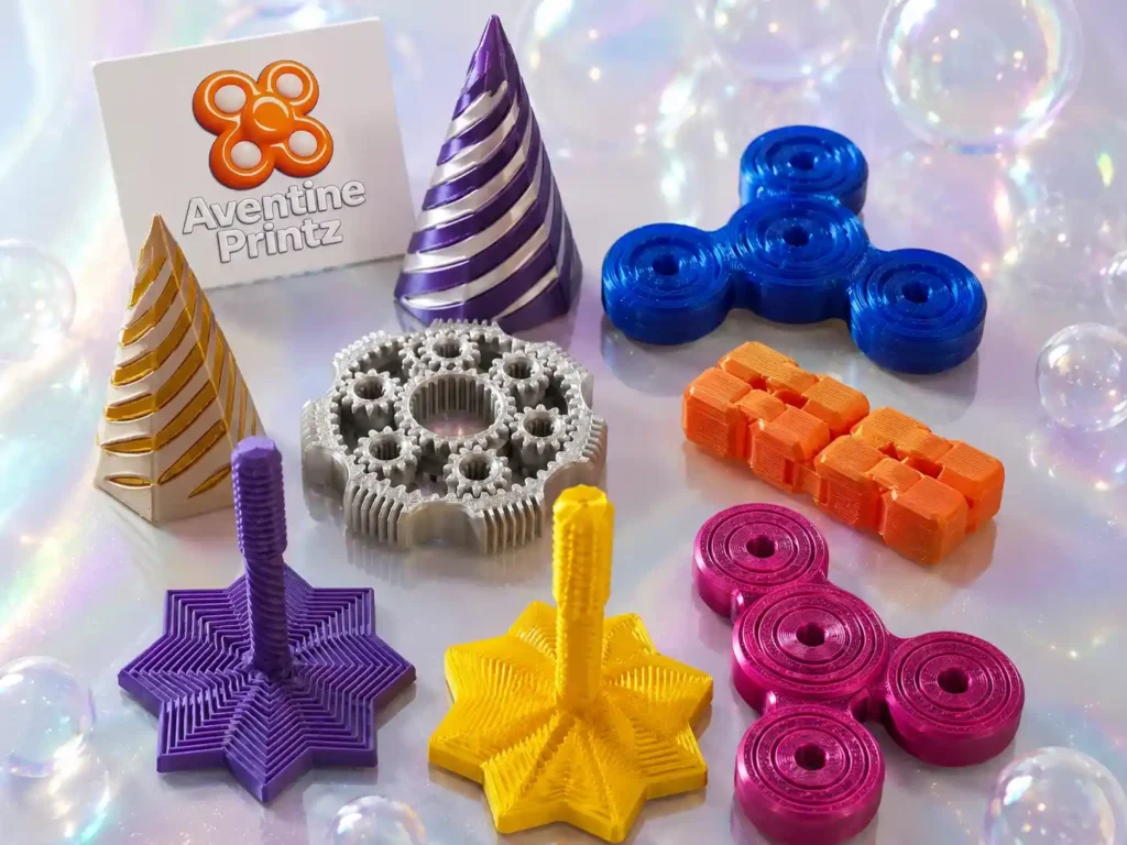 3D printed sensory toys made with PLA filament showing detailed tactile fidget designs